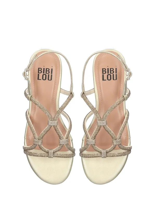 Flat braided sandal covered in rhinestones