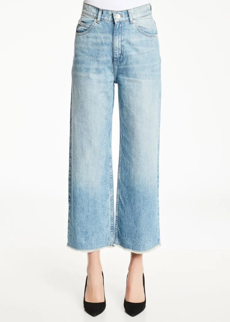 Jeans con orlo a taglio vivo