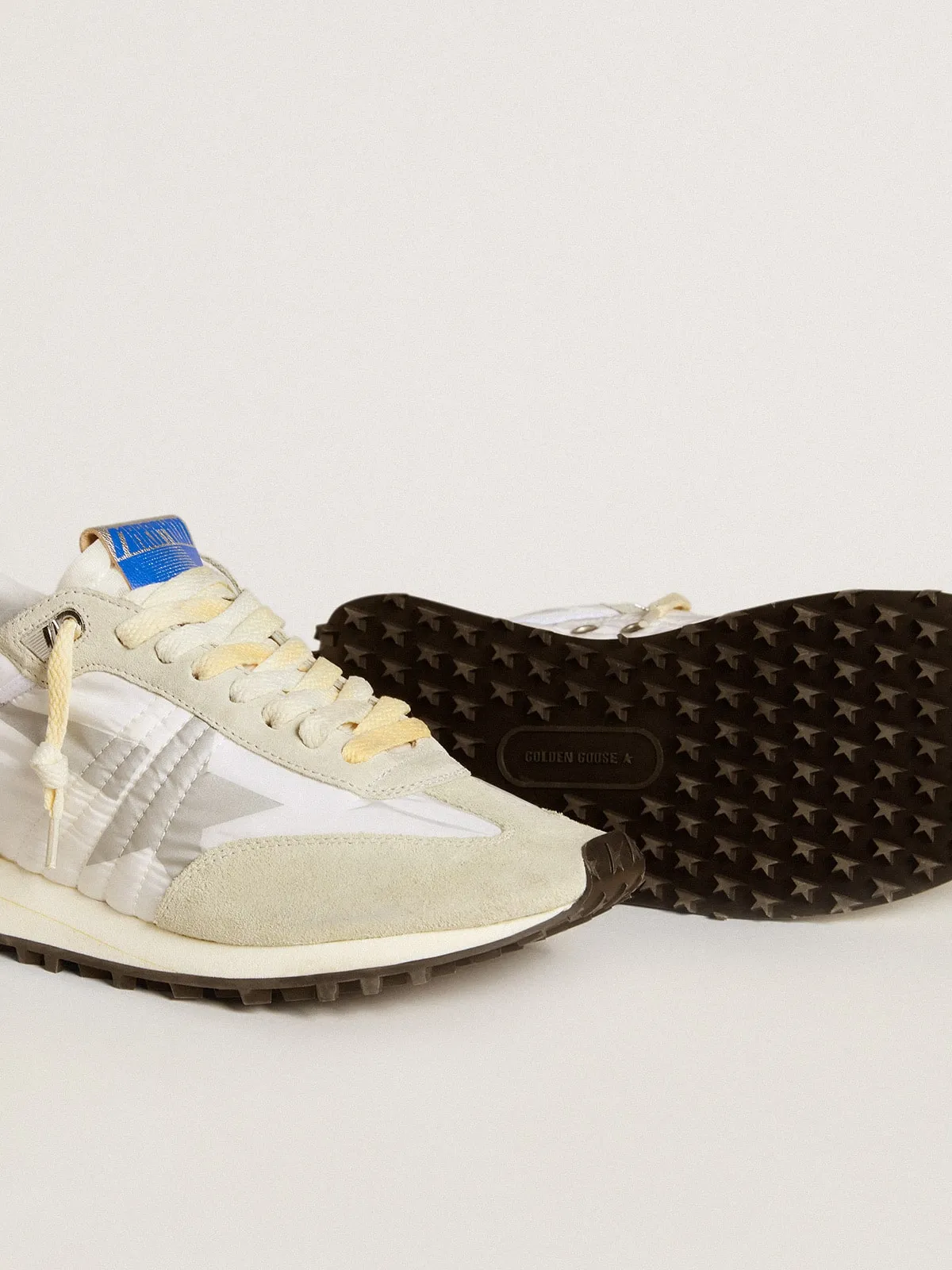 Marathon Donna con tomaia in nylon bianco e stella argento