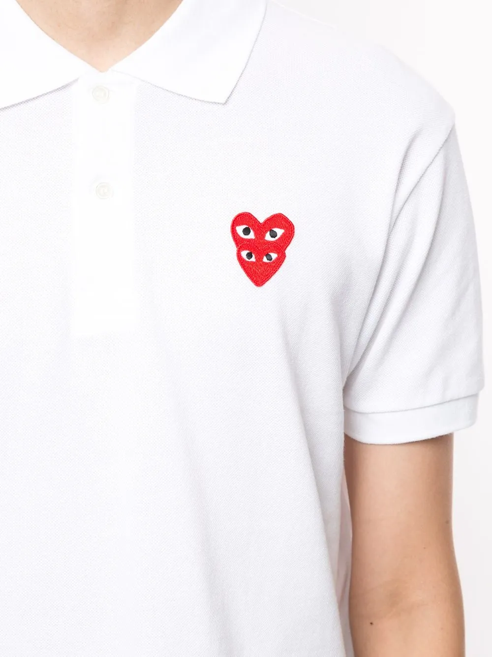 Polo con applicazione logo ricamato